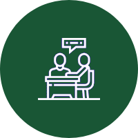 A green circle with two people sitting at a table